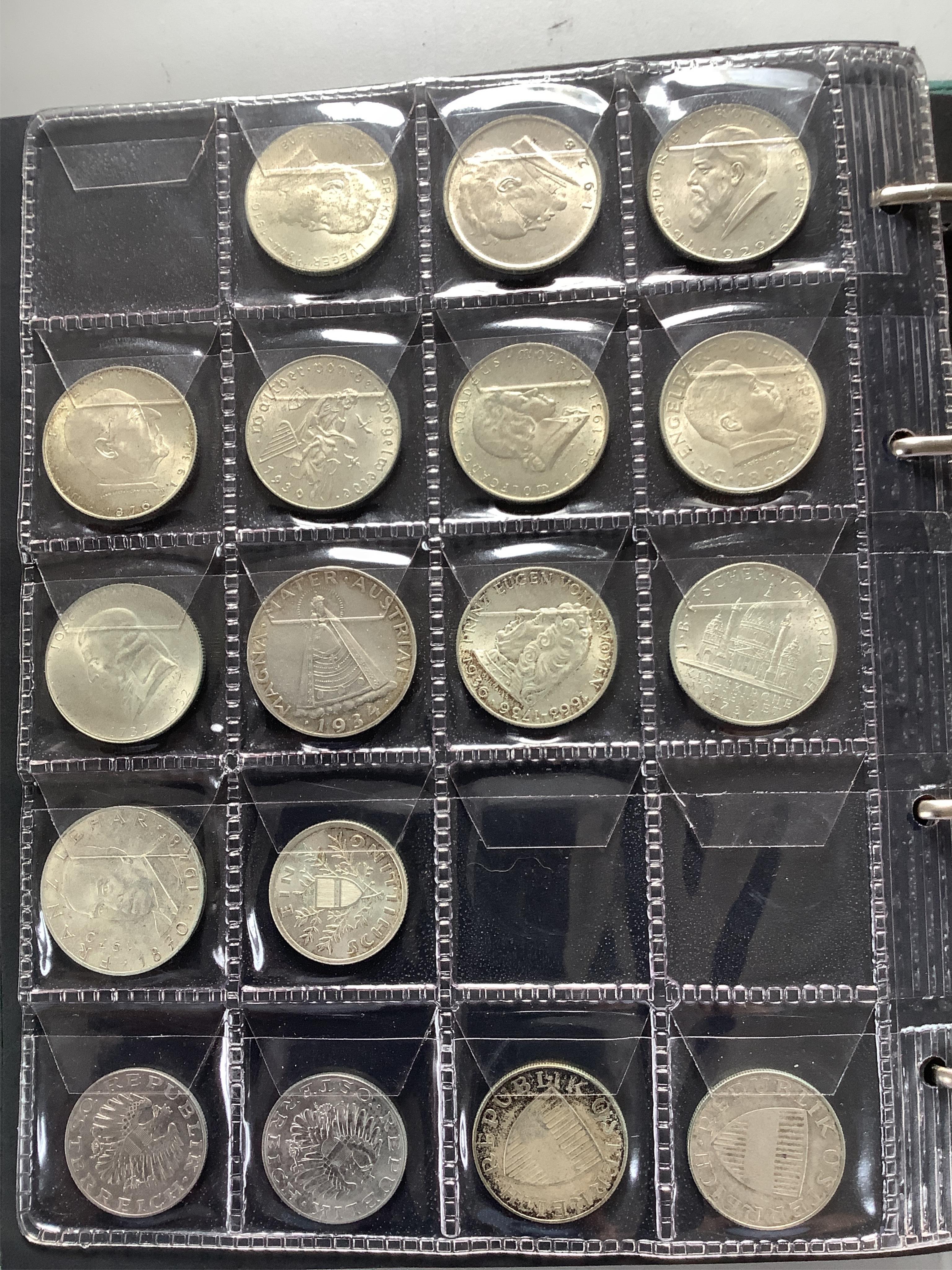 German, Austrian and World coins, in 3 albums, highlights include-, Austria, 17th-20th century; Maria Theresa half Thaler 1759, cleaned otherwise VF, various 1920s-1930s commemorative two shillings, VF or better, France,